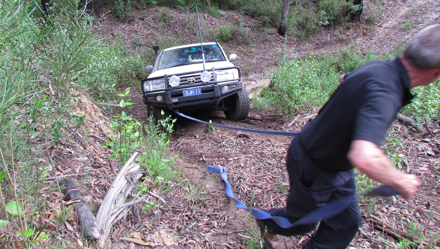 09-Hoppy needs a snatch out of a boggy creek crossing.JPG